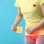 Donna con sintomi di infezione alle vie urinarie